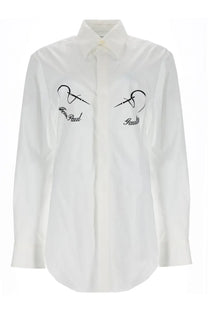Jean Paul Gaultier women’s white button-down shirt with black embroidered needle and thread designs on the chest