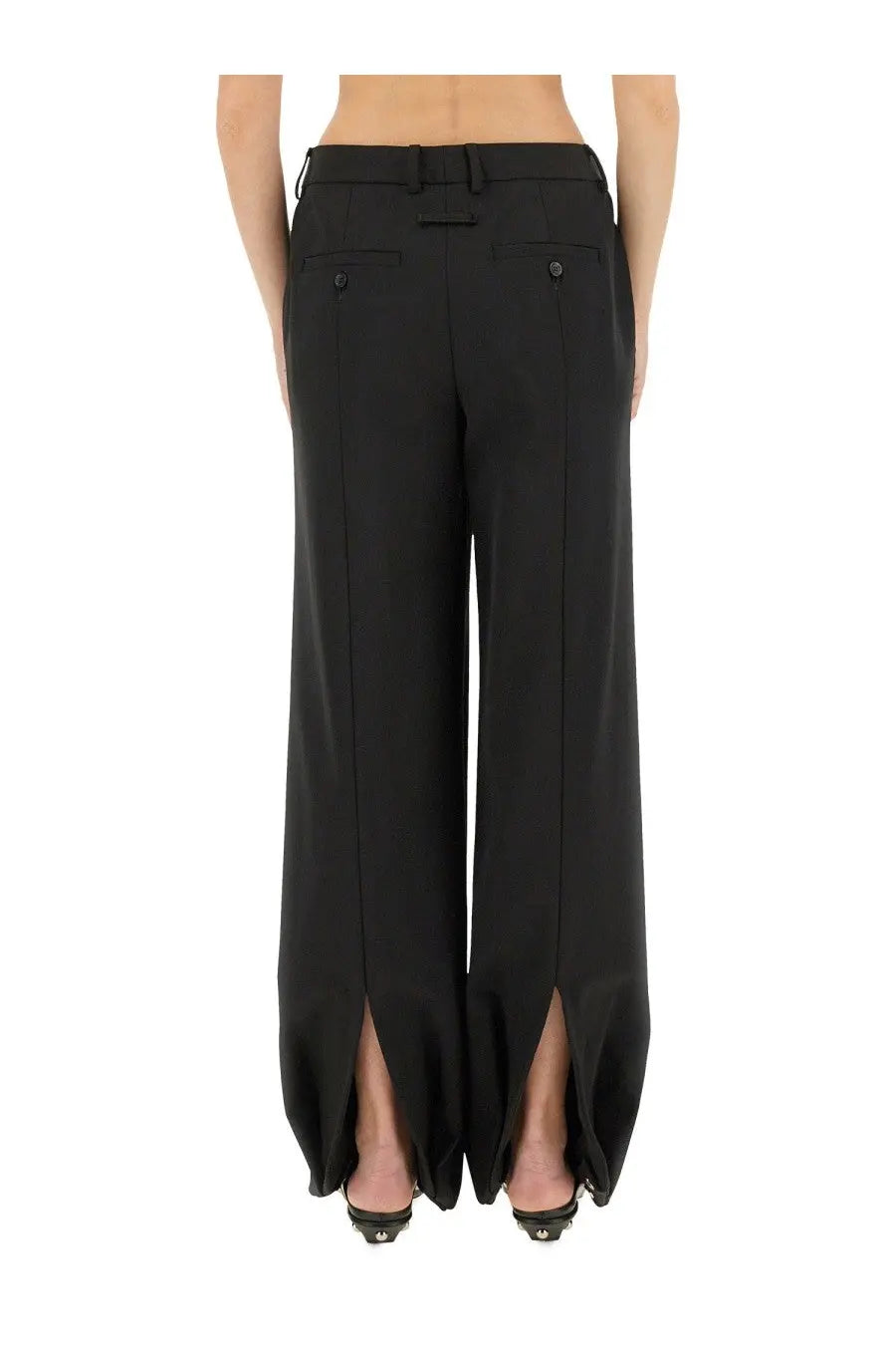 Jean Paul Gaultier women’s black wide-leg high waist trousers with front button pockets and hem slit