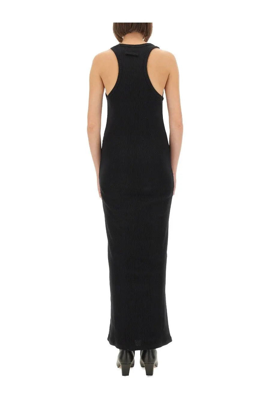 Black ribbed knit sleeveless maxi dress with back cutout detail by jean paul gaultier shown from the back side