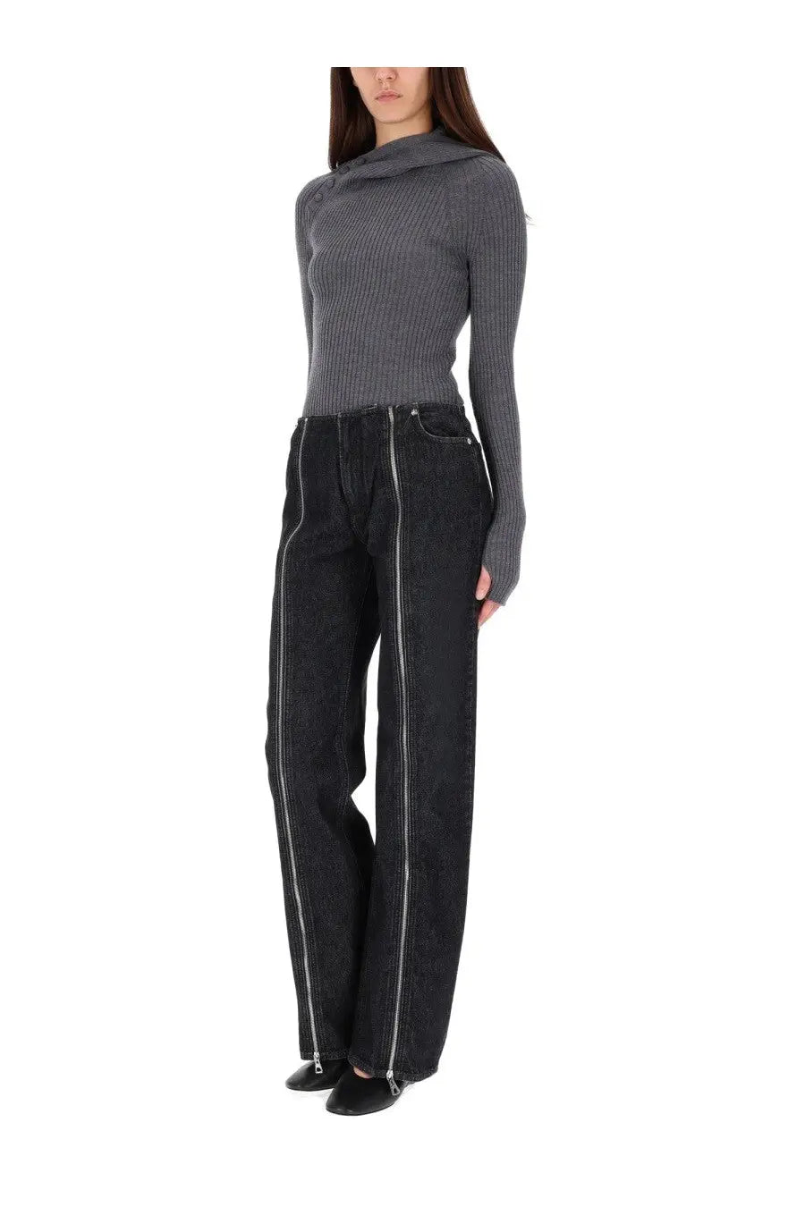 Black denim wide-leg pants with silver zippers on seams paired with jean paul gaultier women’s grey ribbed wool sweater