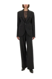 Jean Paul Gaultier women’s black tailored blazer with structured shoulders and single button closure