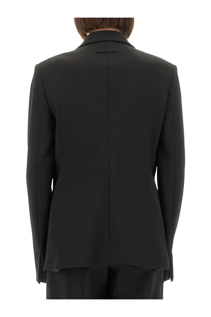 Jean Paul Gaultier women’s black tailored blazer with structured back and notched lapel shown from the back side