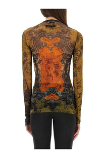 Jean Paul Gaultier women’s long-sleeved top in sheer mustard-yellow and black distressed fabric with ornate orange and brown print