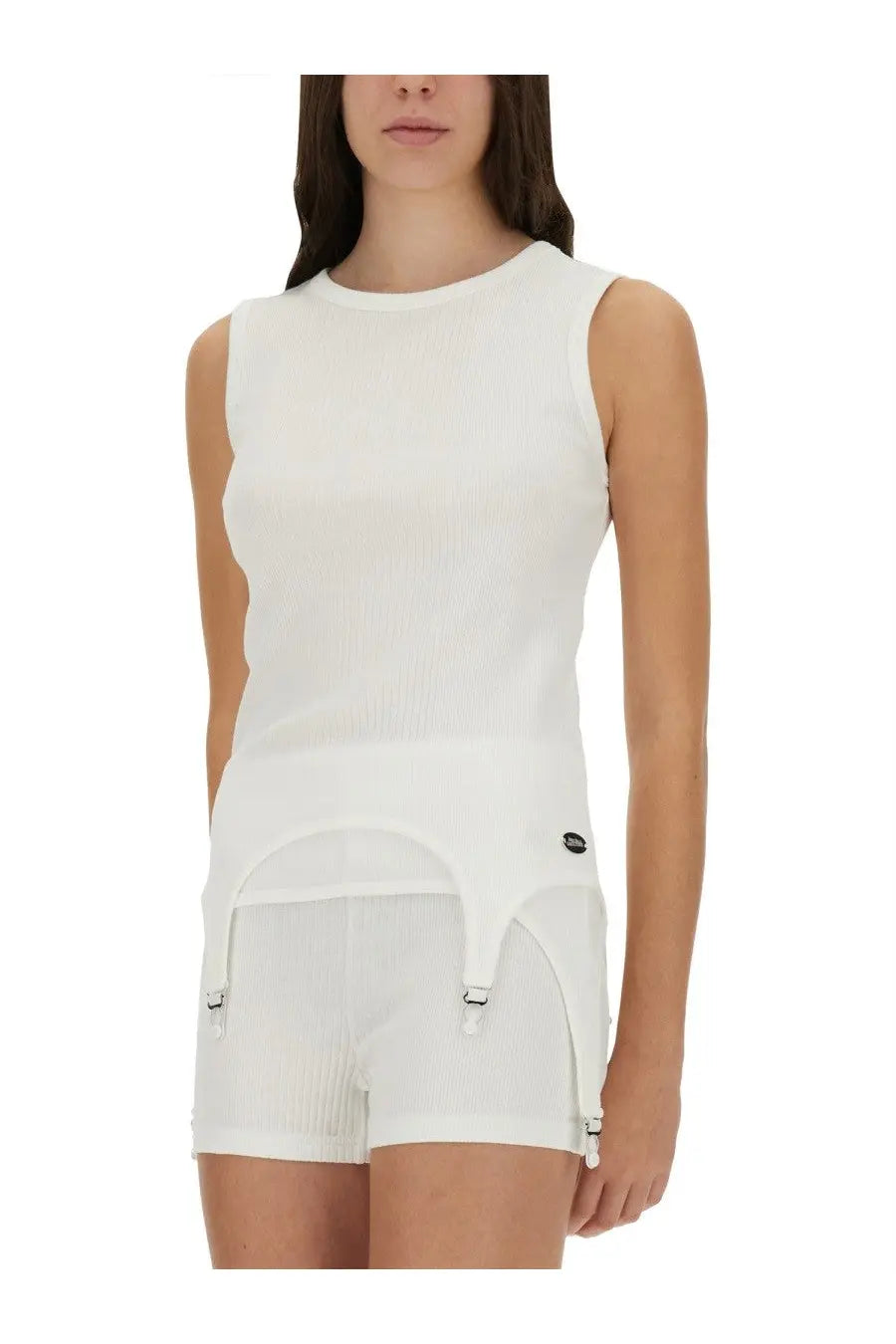 White ribbed knit sleeveless top by jean paul gaultier featuring garter belt style shorts in matching white