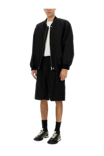 Jil sander men’s black bomber jacket with ribbed collar and front zipper made from durable material