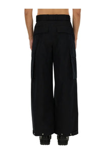 Jil sander men’s black wide-leg cargo pants with multiple pockets and belt detail in durable fabric