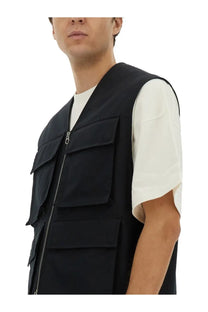 Jil Sander men’s black cargo vest with multiple flap pockets and central zipper in durable fabric