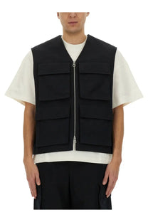 Jil sander men’s black cargo vest with multiple flap pockets and central zipper in durable utility fabric