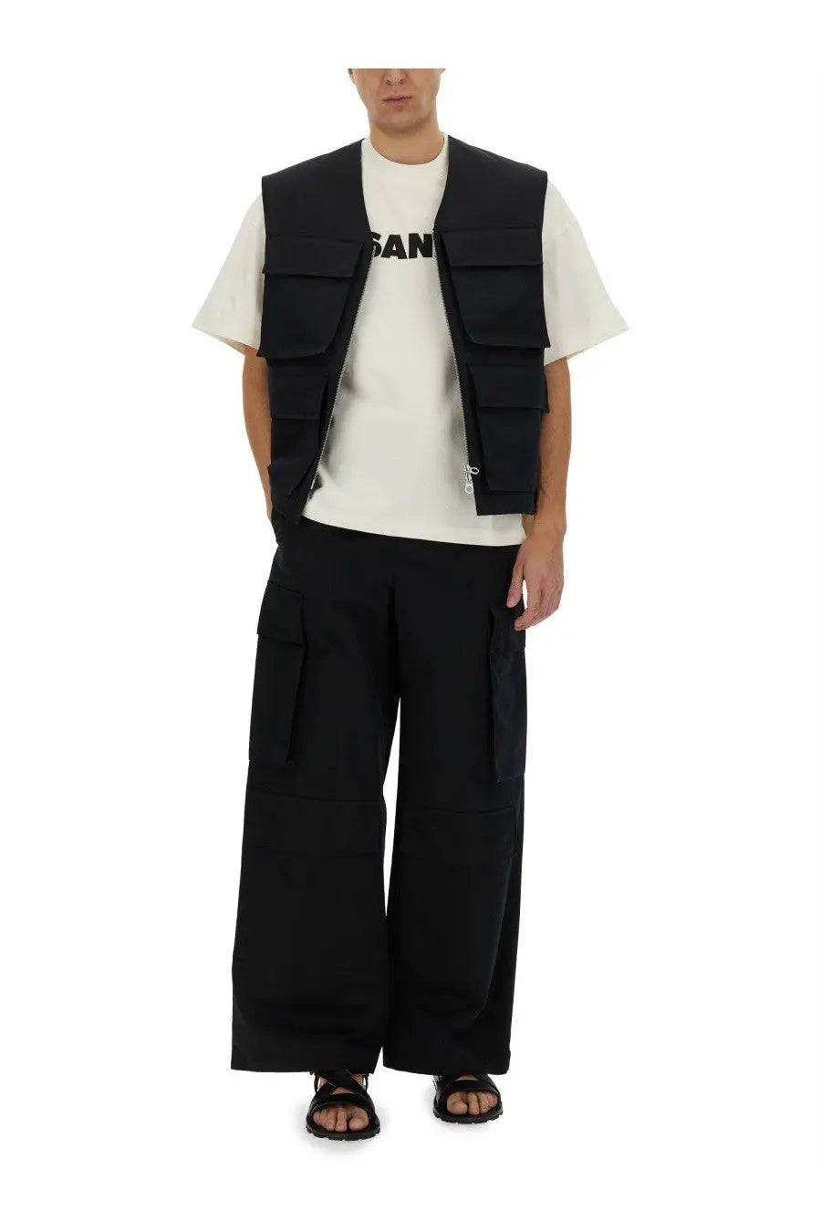 Black jil sander men’s cargo vest with multiple flap pockets and zipper closures in durable utility fabric