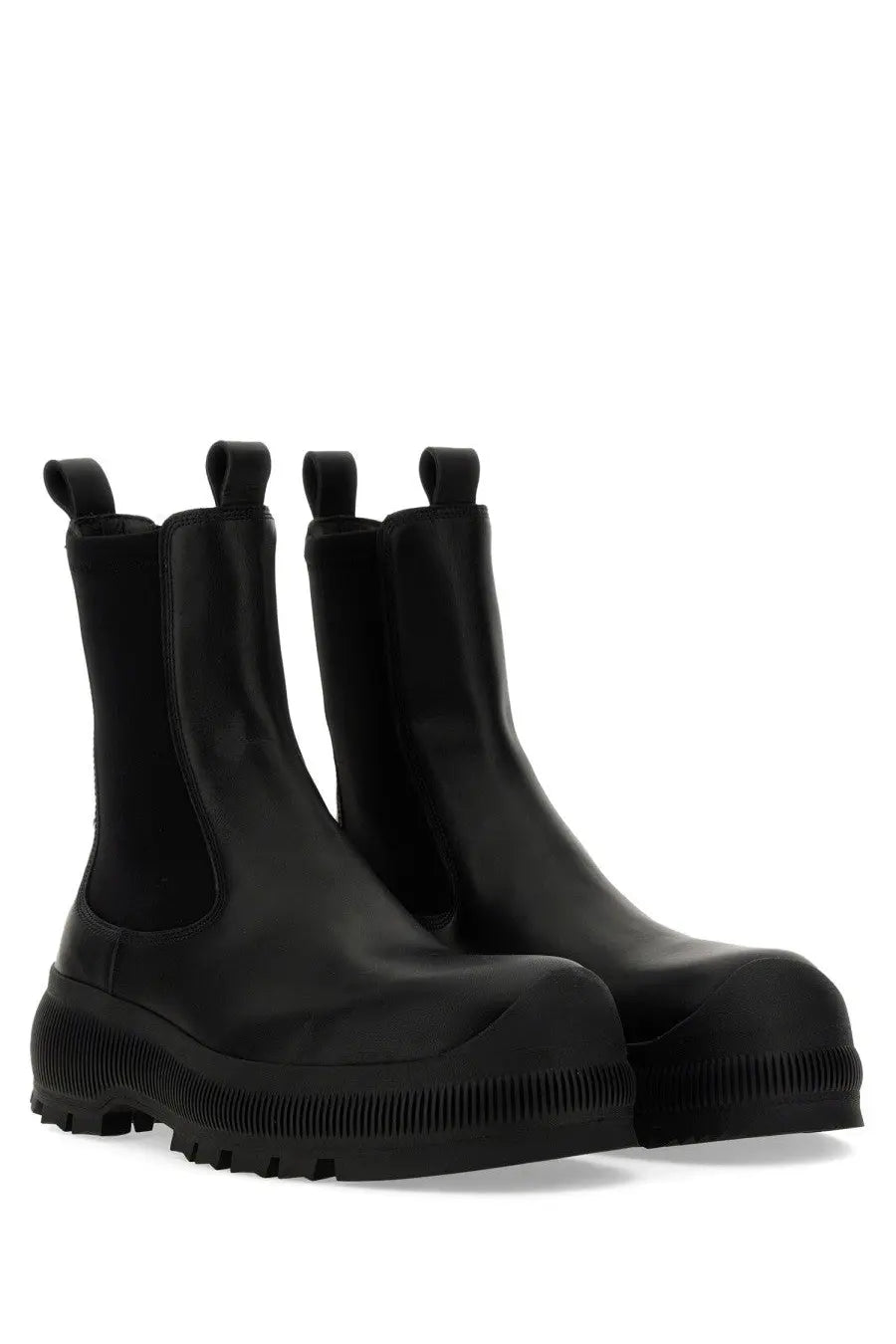Jil sander men’s black rubber chelsea boot with chunky ribbed sole and elastic side panels for easy wear