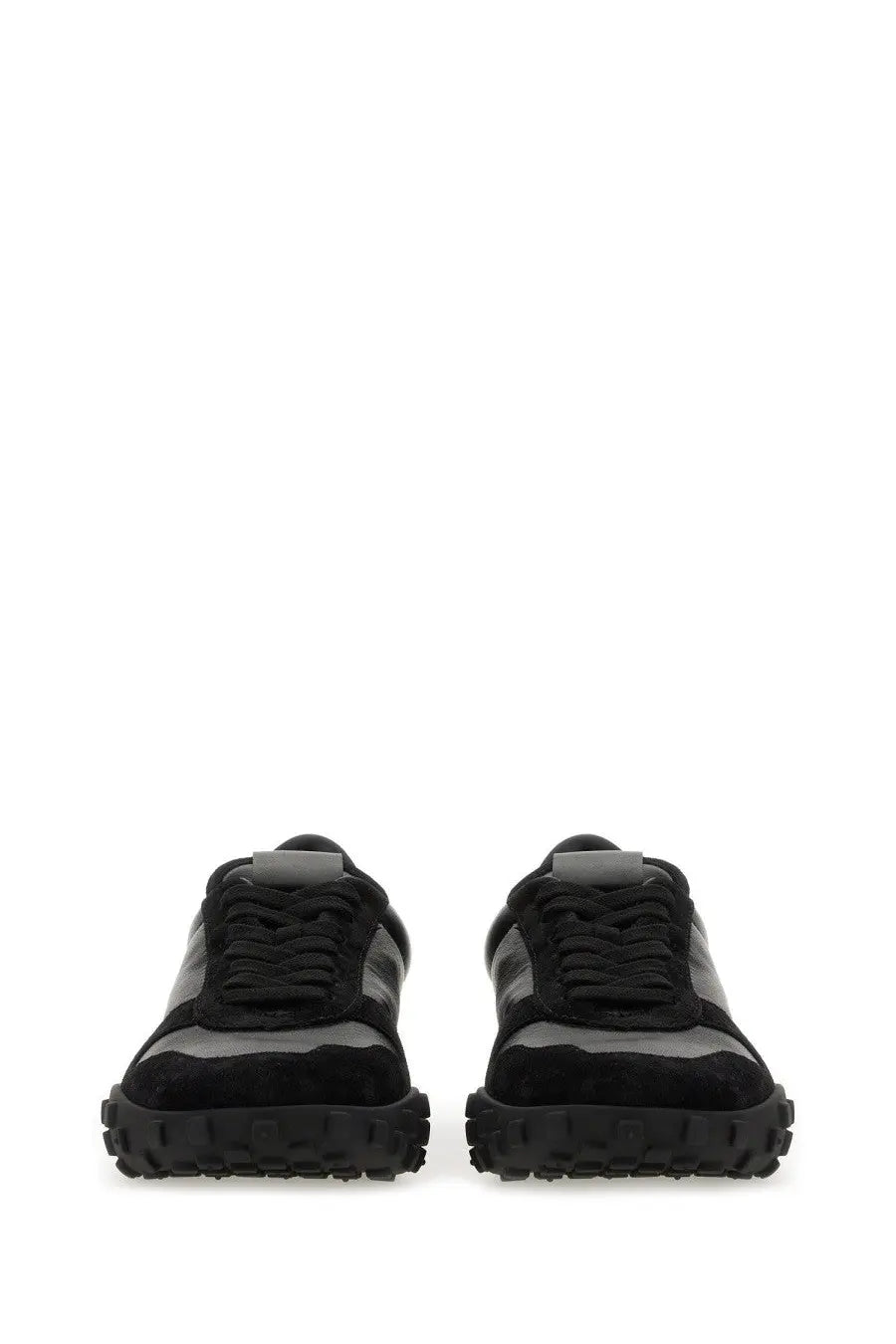 Jil Sander men’s low top sneaker in black with black suede and matte gray panels and a chunky rubber sole