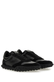 Jil sander men’s low top sneaker in black suede and patent leather with a chunky rubber sole