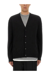 Black jil sander men’s merino wool cardigan with v-neck and button closure shown from the front