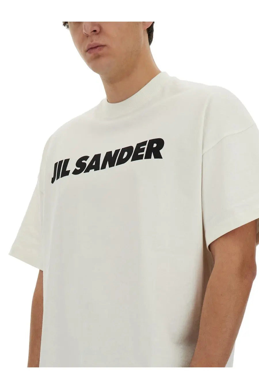 White jil sander men’s t-shirt with bold black lettering across the chest in cotton fabric