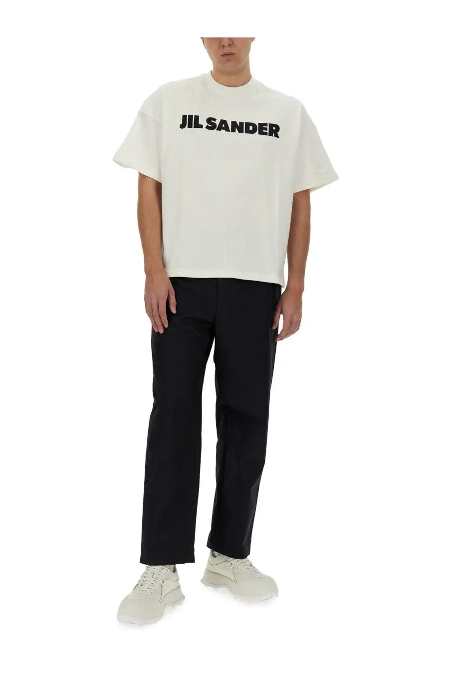 White jil sander men’s t-shirt with bold black lettering across the chest in soft cotton material