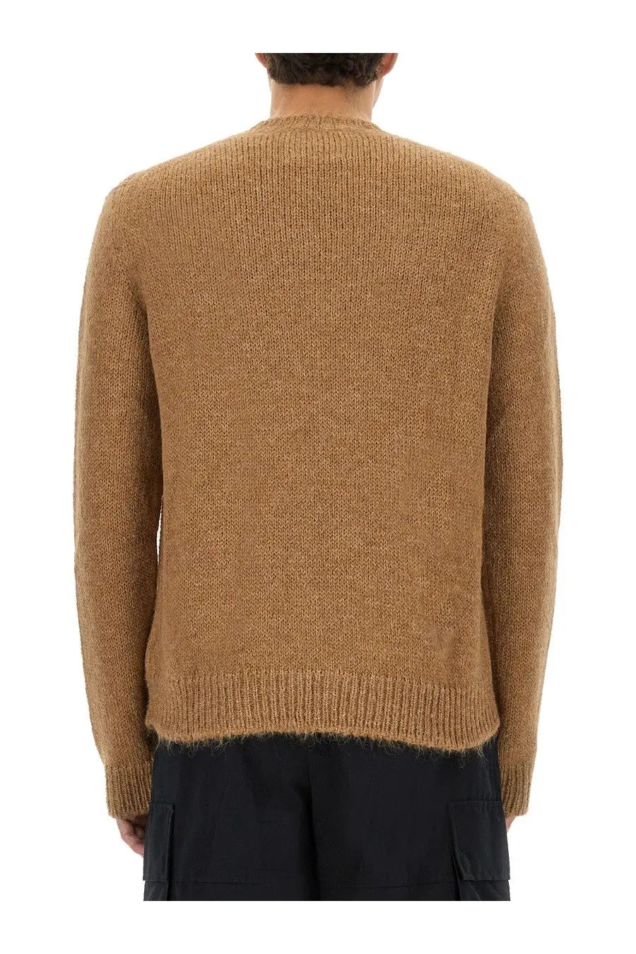 A textured camel-colored knit wool blend sweater with ribbed hem and cuffs from Jil Sander men’s collection