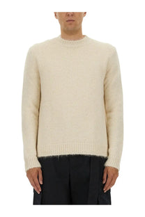 Cream-colored jil sander men’s wool blend sweater with textured knit and ribbed crew neckline and cuffs