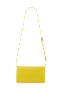 Bright yellow jil sander women’s all day bag with rectangular shape, minimalist design, and slender crossbody strap