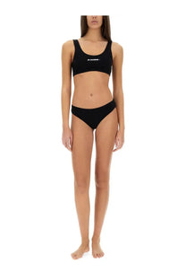 Black two-piece swimsuit with white il sandro branding on the top from jil sander womens bikini briefs collection