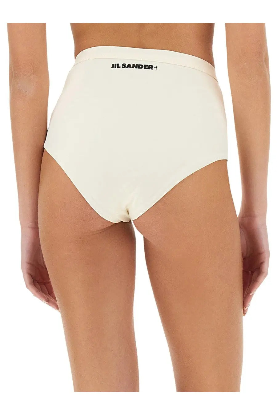 Cream-colored high-waisted jil sander bikini briefs with black logo waistband in women’s white underwear collection