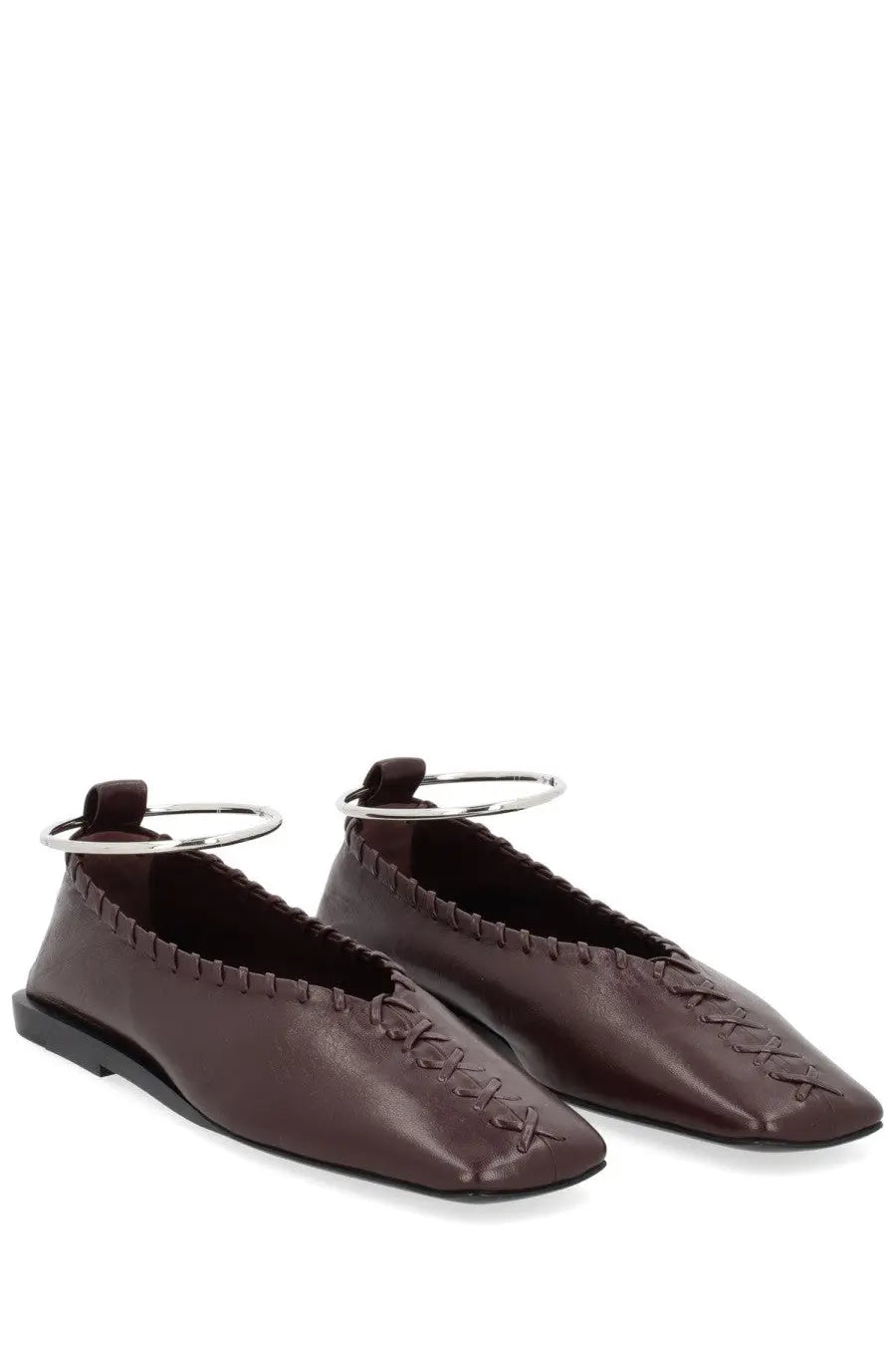 Brown leather jil sander women’s dancer ring flats showing silver ring detail at the back