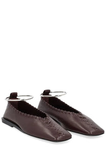Brown leather jil sander women’s dancer ring flats showing silver ring detail at the back