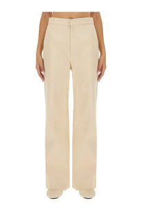 Cream-colored wide-leg trousers with a sleek minimalist design from jil sander women’s flared pants white collection