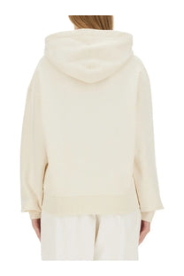Jil Sander women’s cream-colored oversized hoodie with soft relaxed fit and ribbed cuffs in white fabric