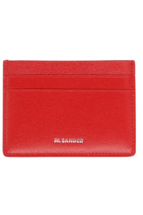 Red leather jil sander womens card holder with embossed logo and stitched edges perfect for organizing cards