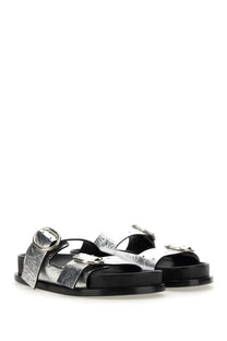 Jil Sander women’s silver leather sandals with silver buckle straps and black rubber soles