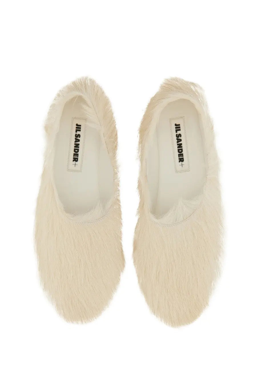 Cream-colored fluffy fur slip-on low leather slippers for women by Jil Sander in white