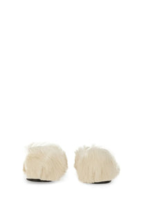 Jil Sander women’s low leather slipper white with cream-colored fluffy fur and soft plush texture with black soles