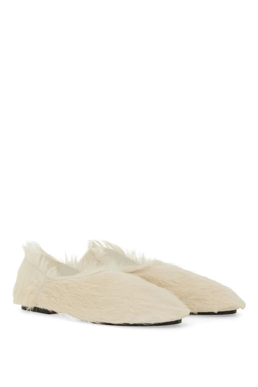 Jil Sander women’s cream-colored slip-on flats with fuzzy leather upper and black soles