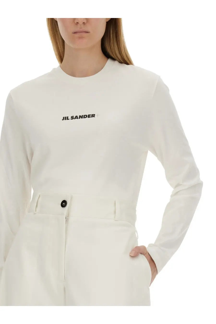 Jil Sander women’s minimalist white long-sleeved shirt with subtle black logo embroidery on the chest