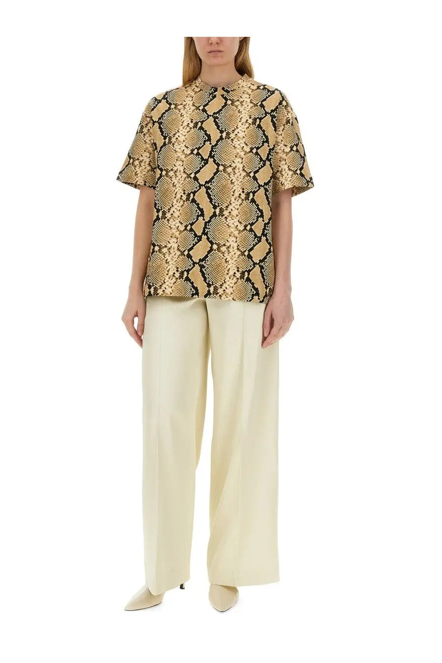 Jil Sander women’s short-sleeved shirt with bold gold and black snake skin print in smooth shiny fabric