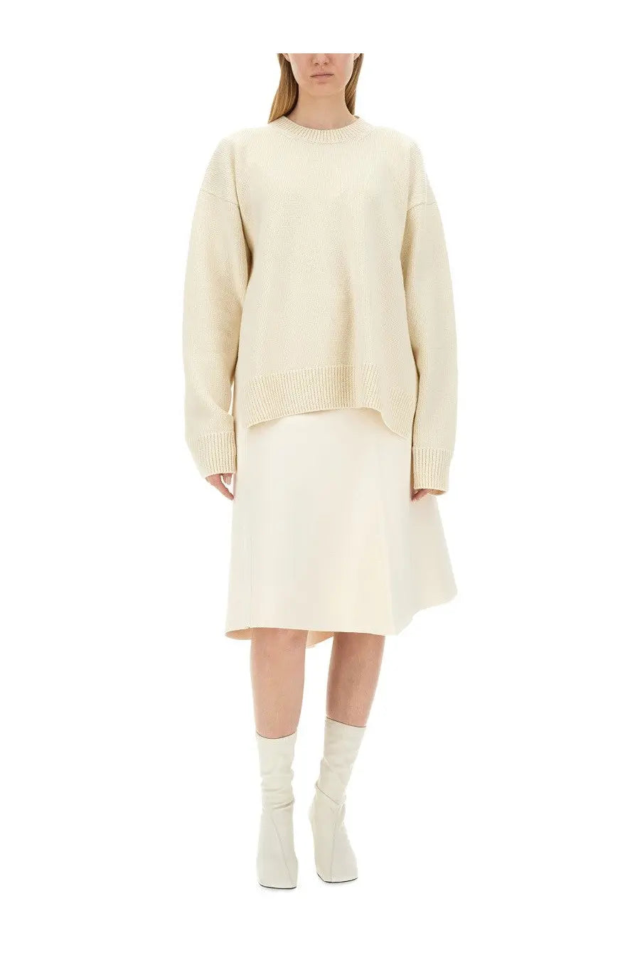 Cream-colored oversized wool sweater with ribbed cuffs and hem by jil sander for women in white