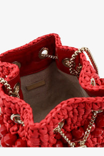 Red crocheted raffia bucket bag with gold-tone chain straps and decorative beads by jimmy choo women