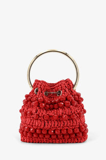 Vibrant red jimmy choo women’s bon bon raffia bucket bag with gold-tone circular handle and decorative beads