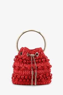 Jimmy Choo women’s bon bon raffia bucket bag in vibrant red crochet with glossy beads and gold circular handle