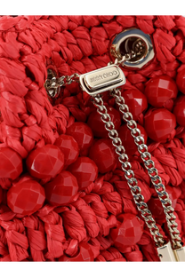Jimmy Choo women’s bon bon raffia bucket bag red with vibrant woven straw and silver chain strap with logo plaque