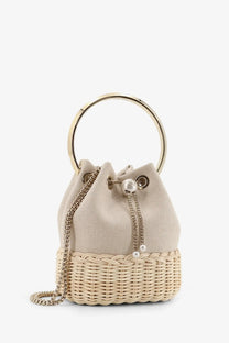 Beige jimmy choo bon bon raffia and canvas bucket bag with gold circular handle and pearl drawstring closure
