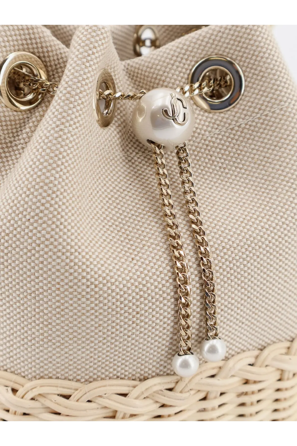 Jimmy Choo women’s bon bon raffia and beige canvas bucket bag with gold-tone hardware and pearl accents