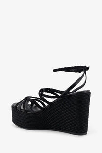 Black braided leather wedge sandal with textured espadrille-style heel by jimmy choo for women