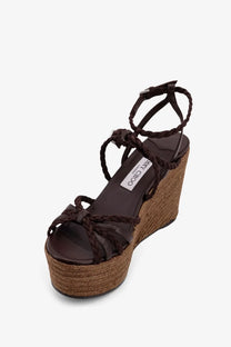 Brown braided leather wedge sandal with woven espadrille sole and ankle strap from Jimmy Choo womens Nyra sandals