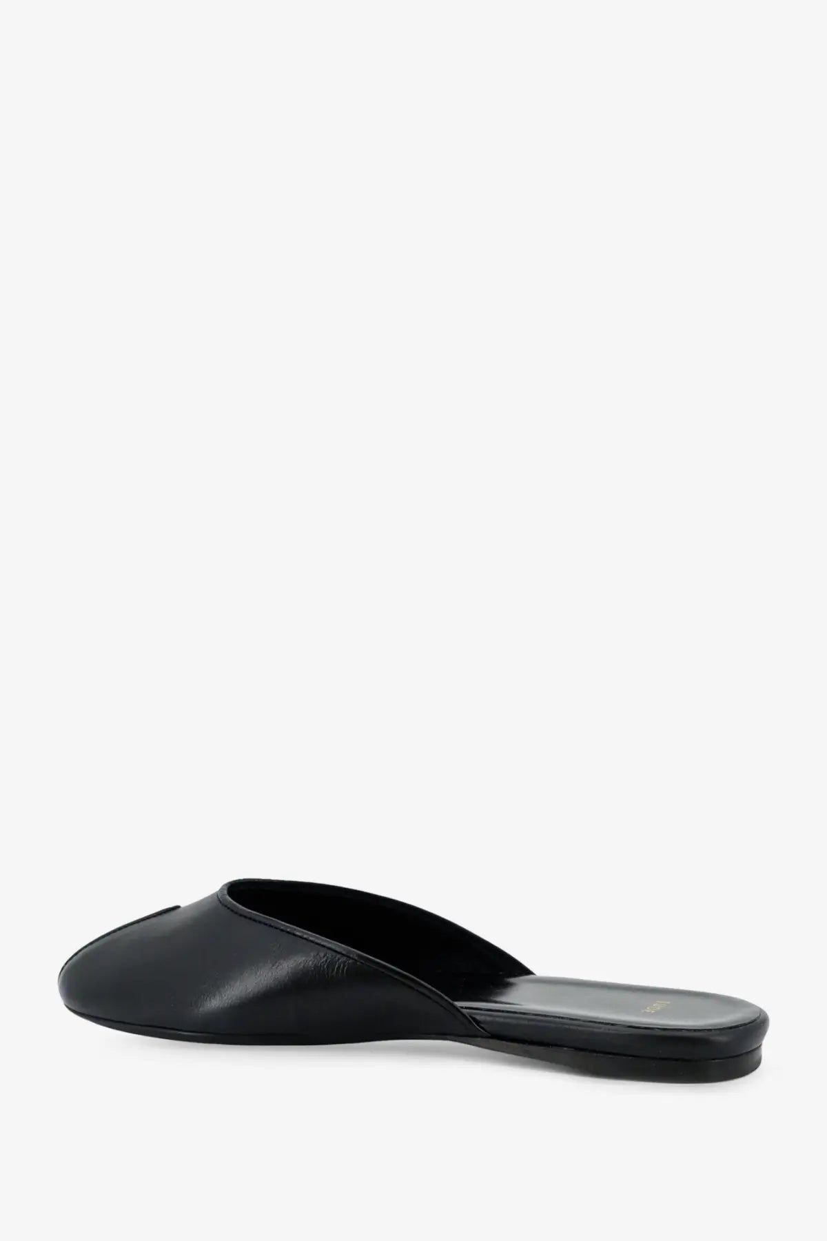 Jude women’s date flat leather sandals in black featuring a sleek, minimalist black leather mule slip-on design