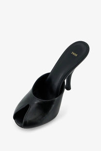Black leather Jude women’s date mule sandals with sleek minimalist design and peep-toe silhouette