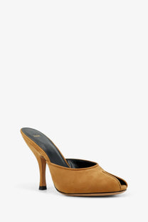 Tan suede jude women’s date mule sandals with black insole and slender tan stiletto heel shown from the back