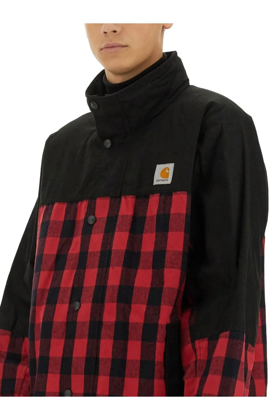 Black and red plaid carhartt jacket by junya watanabe man with high collar and button closures