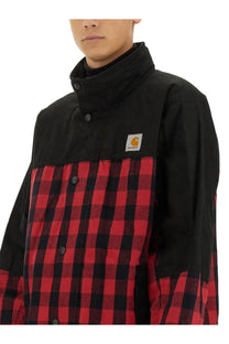 Black and red plaid carhartt jacket by junya watanabe man with high collar and button closures
