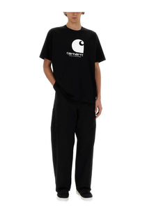 Black carhartt t-shirt by Junya Watanabe Man featuring white logo and iconic circular emblem on the front
